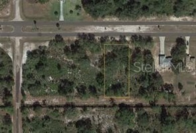 One-half acre lot located in the lake community of Indian Lake on Indian Lake Estates Golf and Country Club in Florida - for sale on GolfHomes.com, golf home, golf lot