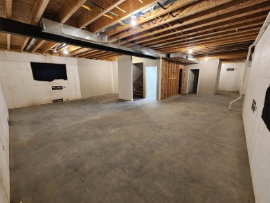 Beautiful Golf Course Retreat on .62 Acres - Move-In Ready on The Ridge Golf Club in Iowa - for sale on GolfHomes.com, golf home, golf lot