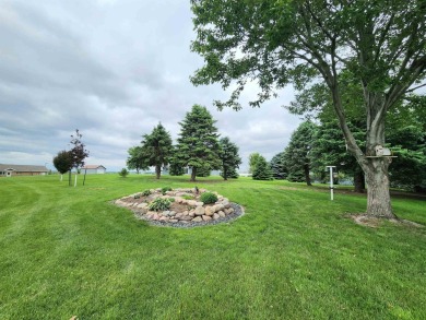 Beautiful Golf Course Retreat on .62 Acres - Move-In Ready on The Ridge Golf Club in Iowa - for sale on GolfHomes.com, golf home, golf lot