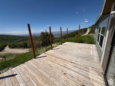 This effectively brand new home is located in the gated Skyline on Skyline Mountain Resort and Golf Course in Utah - for sale on GolfHomes.com, golf home, golf lot