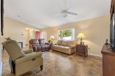 2/2 PLUS OFFICE , SOLAR PANELS. Furnished. Palm model in the on Eagle Ridge At Spruce Creek Country Club in Florida - for sale on GolfHomes.com, golf home, golf lot