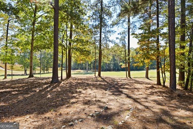 Immaculately maintained home located on such a beautiful on Mirror Lake Golf Club in Georgia - for sale on GolfHomes.com, golf home, golf lot