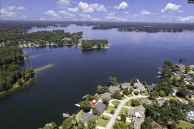 Welcome to your 4 bed, 3.5 bath ultimate lakefront entertainment on Timberlake Country Club in South Carolina - for sale on GolfHomes.com, golf home, golf lot