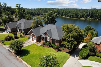 Welcome to your 4 bed, 3.5 bath ultimate lakefront entertainment on Timberlake Country Club in South Carolina - for sale on GolfHomes.com, golf home, golf lot