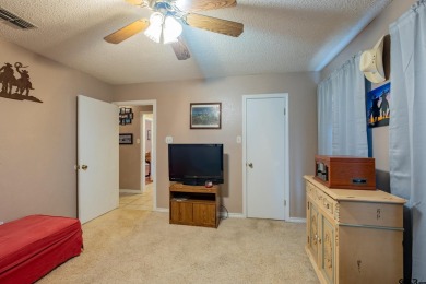 Located in the gated community of Hideaway Lake, this inviting on Hide-A-Way Lake Golf Course in Texas - for sale on GolfHomes.com, golf home, golf lot