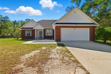 Welcome to this beautifully maintained 3-bedroom, 2-bathroom on Wildwood Country Club in Florida - for sale on GolfHomes.com, golf home, golf lot