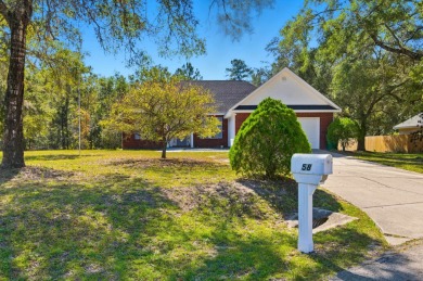 Welcome to this beautifully maintained 3-bedroom, 2-bathroom on Wildwood Country Club in Florida - for sale on GolfHomes.com, golf home, golf lot