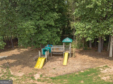 Beautifully maintained 4 bedroom 3.5 bath in Woodlake on Bear Creek Golf Club Inc in Georgia - for sale on GolfHomes.com, golf home, golf lot