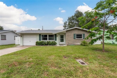 One or more photo(s) has been virtually staged. Charming Dunedin on The Dunedin Country Club in Florida - for sale on GolfHomes.com, golf home, golf lot