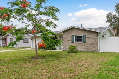 One or more photo(s) has been virtually staged. Charming Dunedin on The Dunedin Country Club in Florida - for sale on GolfHomes.com, golf home, golf lot