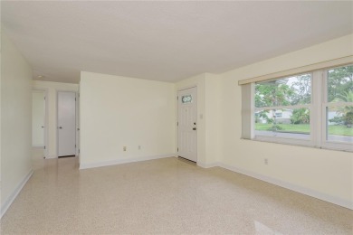 One or more photo(s) has been virtually staged. Charming Dunedin on The Dunedin Country Club in Florida - for sale on GolfHomes.com, golf home, golf lot