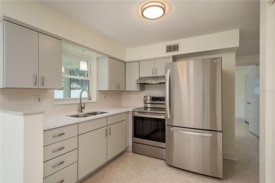 One or more photo(s) has been virtually staged. Charming Dunedin on The Dunedin Country Club in Florida - for sale on GolfHomes.com, golf home, golf lot