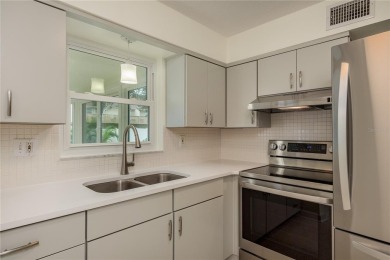 One or more photo(s) has been virtually staged. Charming Dunedin on The Dunedin Country Club in Florida - for sale on GolfHomes.com, golf home, golf lot