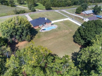 Welcome to this IMMACULATE, well-maintained country home with on Brent Bruehl Mem. Golf Course in Oklahoma - for sale on GolfHomes.com, golf home, golf lot