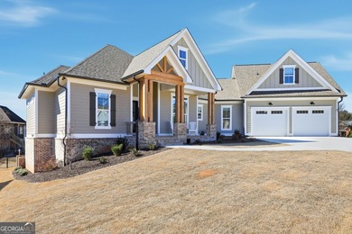 Simple luxury at its finest! Discover this rare ranch plan on Traditions of Braselton Golf Club in Georgia - for sale on GolfHomes.com, golf home, golf lot