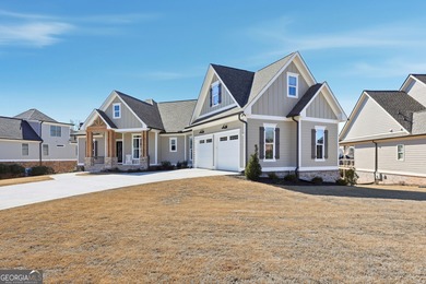 Simple luxury at its finest! Discover this rare ranch plan on Traditions of Braselton Golf Club in Georgia - for sale on GolfHomes.com, golf home, golf lot