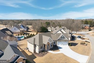 Simple luxury at its finest! Discover this rare ranch plan on Traditions of Braselton Golf Club in Georgia - for sale on GolfHomes.com, golf home, golf lot