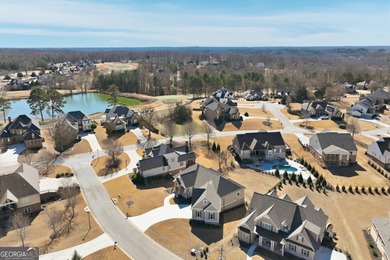 Simple luxury at its finest! Discover this rare ranch plan on Traditions of Braselton Golf Club in Georgia - for sale on GolfHomes.com, golf home, golf lot