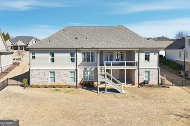 Simple luxury at its finest! Discover this rare ranch plan on Traditions of Braselton Golf Club in Georgia - for sale on GolfHomes.com, golf home, golf lot