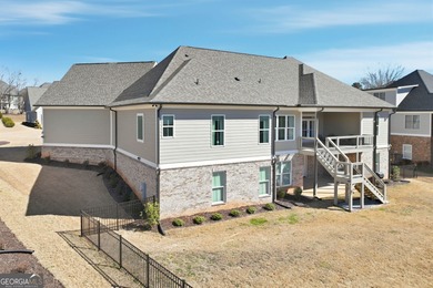 Simple luxury at its finest! Discover this rare ranch plan on Traditions of Braselton Golf Club in Georgia - for sale on GolfHomes.com, golf home, golf lot