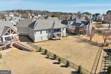 Simple luxury at its finest! Discover this rare ranch plan on Traditions of Braselton Golf Club in Georgia - for sale on GolfHomes.com, golf home, golf lot