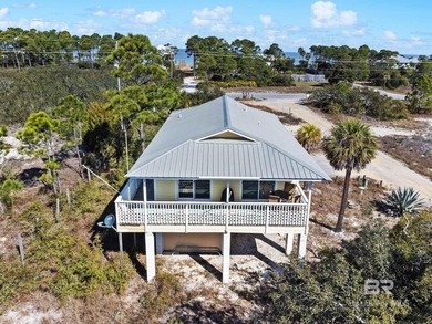 Welcome to your coastal cottage retreat! This adorable 2-bedroom on The Golf Club of the Wharf in Alabama - for sale on GolfHomes.com, golf home, golf lot