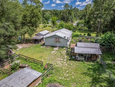 Built in 2014, this move-in ready, well-maintained home features on Wildwood Country Club in Florida - for sale on GolfHomes.com, golf home, golf lot