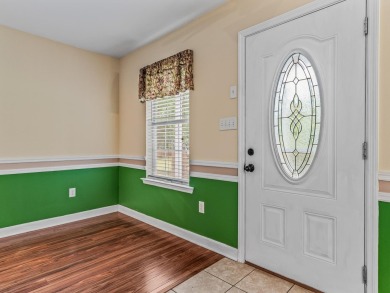 Built in 2014, this move-in ready, well-maintained home features on Wildwood Country Club in Florida - for sale on GolfHomes.com, golf home, golf lot