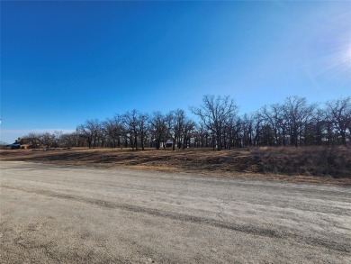 Beautiful corner lot build site with lake views and mature oak on Nocona Hills Golf Course in Texas - for sale on GolfHomes.com, golf home, golf lot