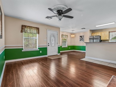 Built in 2014, this move-in ready, well-maintained home features on Wildwood Country Club in Florida - for sale on GolfHomes.com, golf home, golf lot