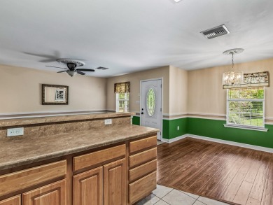 Built in 2014, this move-in ready, well-maintained home features on Wildwood Country Club in Florida - for sale on GolfHomes.com, golf home, golf lot
