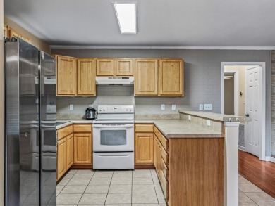 Built in 2014, this move-in ready, well-maintained home features on Wildwood Country Club in Florida - for sale on GolfHomes.com, golf home, golf lot