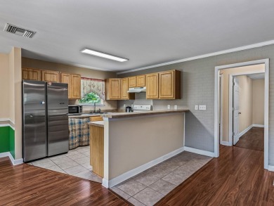 Built in 2014, this move-in ready, well-maintained home features on Wildwood Country Club in Florida - for sale on GolfHomes.com, golf home, golf lot