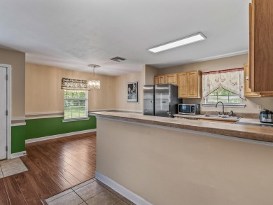 Built in 2014, this move-in ready, well-maintained home features on Wildwood Country Club in Florida - for sale on GolfHomes.com, golf home, golf lot