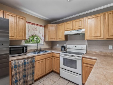 Built in 2014, this move-in ready, well-maintained home features on Wildwood Country Club in Florida - for sale on GolfHomes.com, golf home, golf lot