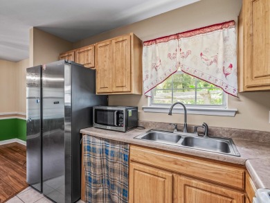 Built in 2014, this move-in ready, well-maintained home features on Wildwood Country Club in Florida - for sale on GolfHomes.com, golf home, golf lot