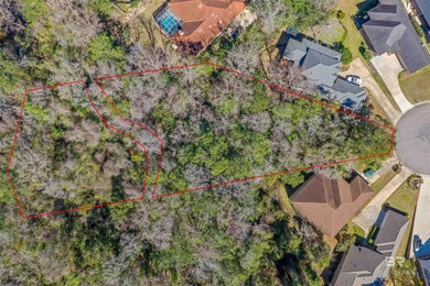 Located on a quiet cul-de-sac and set on 1.39 acres with Rock on Rock Creek Golf Club in Alabama - for sale on GolfHomes.com, golf home, golf lot