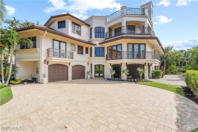 Stunning custom-built residence with modern elegance just steps on Hideaway Beach Golf Course in Florida - for sale on GolfHomes.com, golf home, golf lot