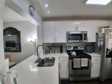 MUST SEE! Beautiful completely remodeled penthouse 2/2 condo in on Sunrise Lakes Phase IV Golf Course in Florida - for sale on GolfHomes.com, golf home, golf lot