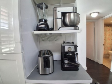 MUST SEE! Beautiful completely remodeled penthouse 2/2 condo in on Sunrise Lakes Phase IV Golf Course in Florida - for sale on GolfHomes.com, golf home, golf lot