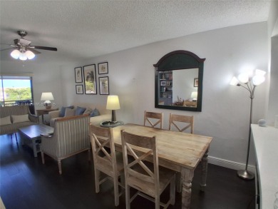 MUST SEE! Beautiful completely remodeled penthouse 2/2 condo in on Sunrise Lakes Phase IV Golf Course in Florida - for sale on GolfHomes.com, golf home, golf lot