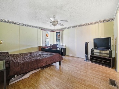 WHAT A  BEAUTIFUL WATER VIEW!  Also, you'll be across the street on El Diablo Executive Golf Course in Florida - for sale on GolfHomes.com, golf home, golf lot