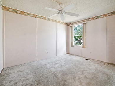 WHAT A  BEAUTIFUL WATER VIEW!  Also, you'll be across the street on El Diablo Executive Golf Course in Florida - for sale on GolfHomes.com, golf home, golf lot