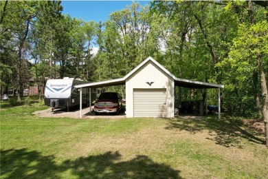 This home is a serene haven that perfectly balances modern on Hidden Haven Golf Club in Minnesota - for sale on GolfHomes.com, golf home, golf lot