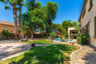 Spacious 5 bedroom, 3 bathroom home with pool in the highly on Trilogy Golf Club At Power Ranch in Arizona - for sale on GolfHomes.com, golf home, golf lot