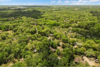 This home is a serene haven that perfectly balances modern on Hidden Haven Golf Club in Minnesota - for sale on GolfHomes.com, golf home, golf lot
