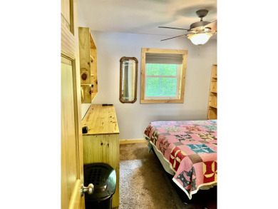 Welcome to your Lakewood retreat! Situated on 1.5 scenic acres on McCauslin Brook Golf and Country Club in Wisconsin - for sale on GolfHomes.com, golf home, golf lot