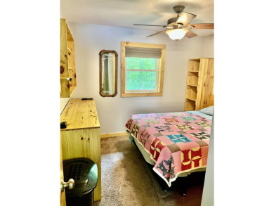 Welcome to your Lakewood retreat! Situated on 1.5 scenic acres on McCauslin Brook Golf and Country Club in Wisconsin - for sale on GolfHomes.com, golf home, golf lot