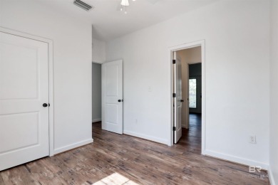 Ready for rental season with this versatile beach house! Totally on Kiva Dunes Golf Club in Alabama - for sale on GolfHomes.com, golf home, golf lot