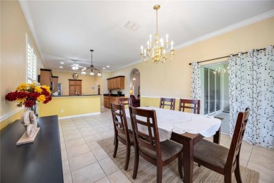 Welcome to this stunning 3-bedroom, 2-bath Eaton model home with on Kings Gate Golf Club in Florida - for sale on GolfHomes.com, golf home, golf lot